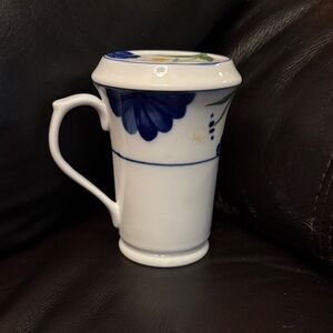Dansk I believe coffee or tea Mug with lid that also acts  as a coaster floral.